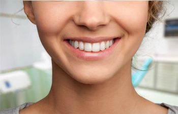 Woman Smiling After Cosmetic Dental Care at Ora Dentistry Elk Grove CA