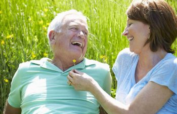 Happy mature couple with perfect smiles.