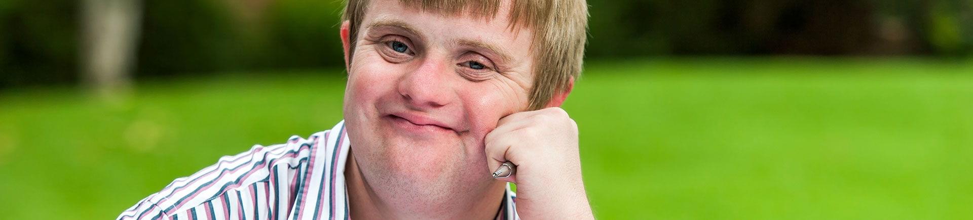 A teenage boy with Down syndrome.