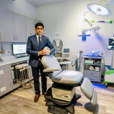 Dr. Devan Dalla of Ora Dentistry in the treatment room