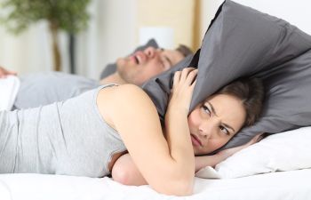 Woman in Bed With Snoring Partner Elk Grove CA