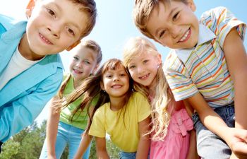 group of happily smiling kids