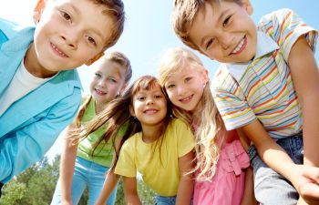 group of happily smiling kids