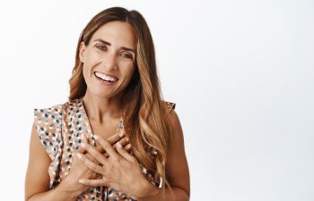 Happy confident middle-aged woman with a perfect smile.